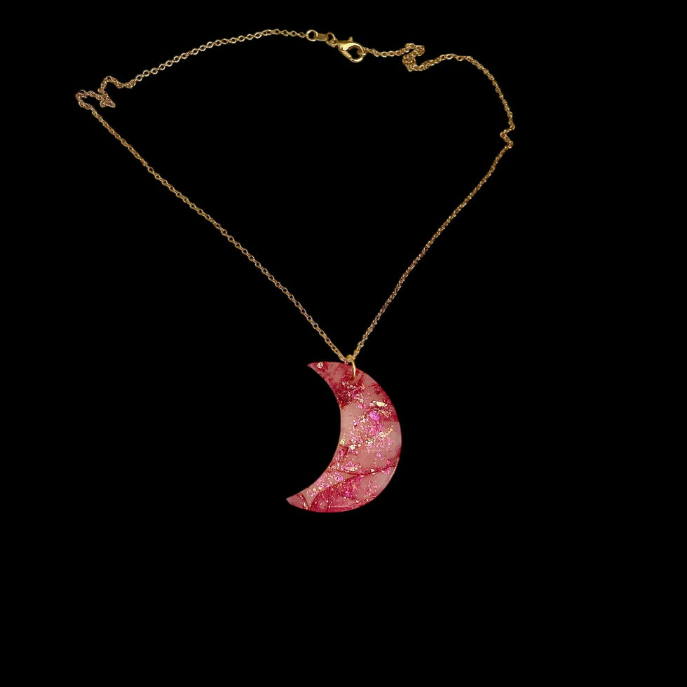 A moon necklace on a gold moon necklace chain for celestial style.