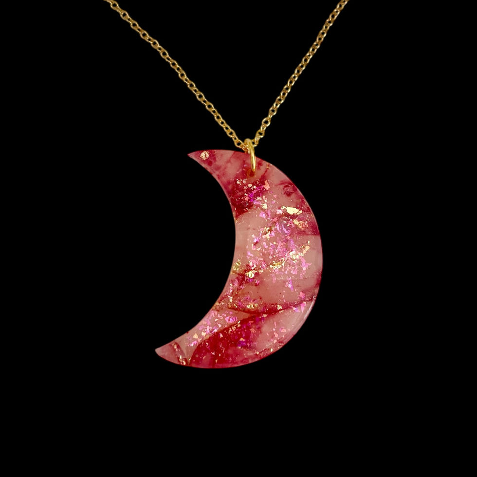 A moon necklace on a gold moon necklace chain for celestial style.