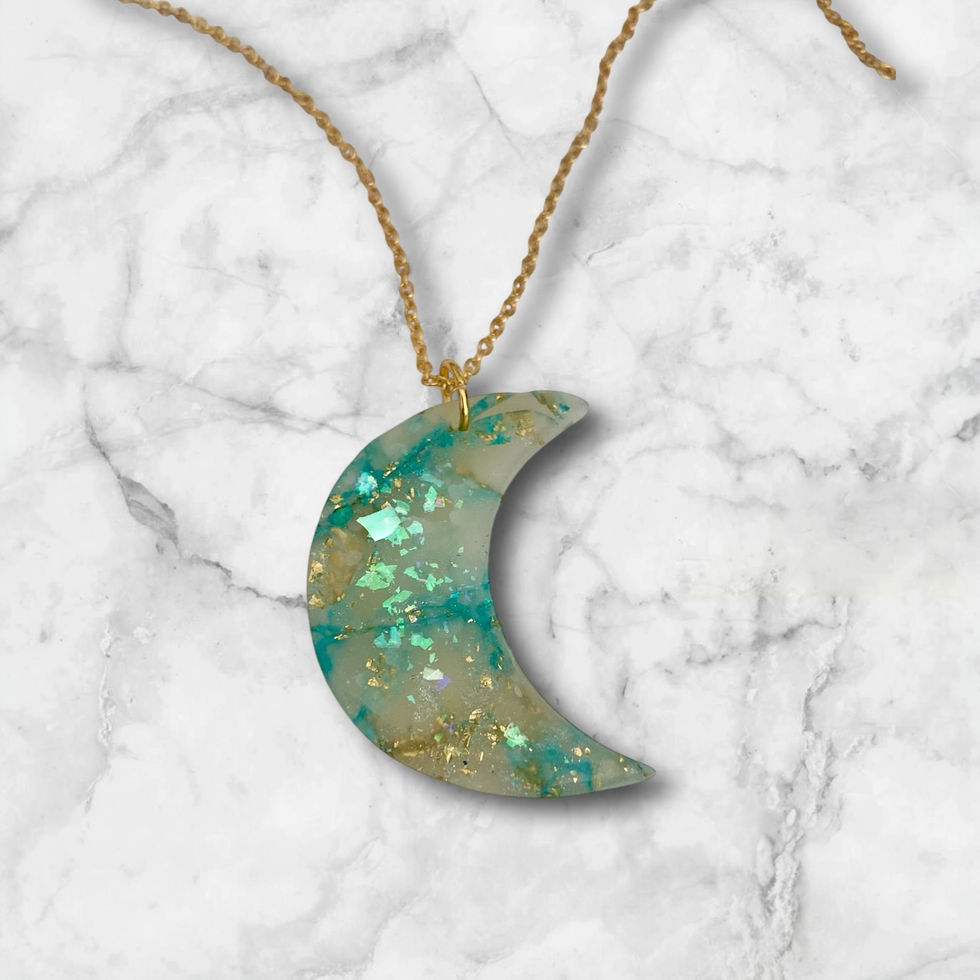 A moon necklace on a gold moon necklace chain for celestial style.