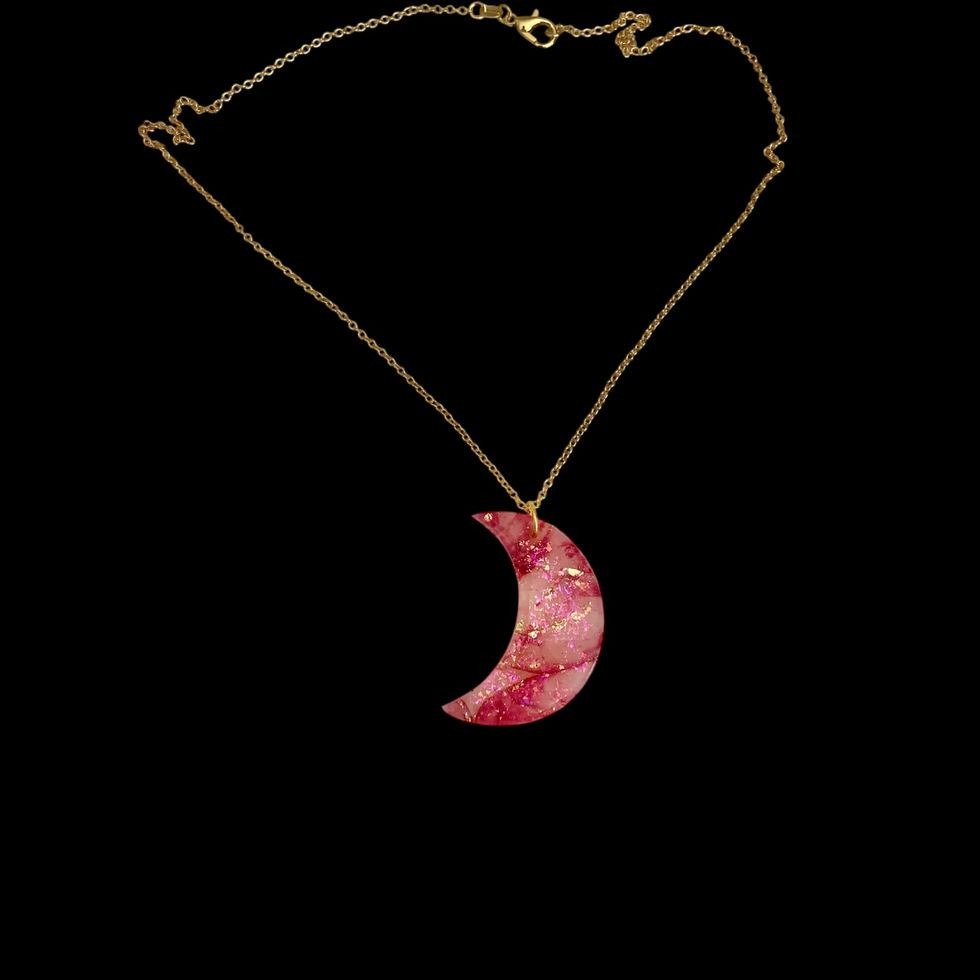 A moon necklace on a gold moon necklace chain for celestial style.