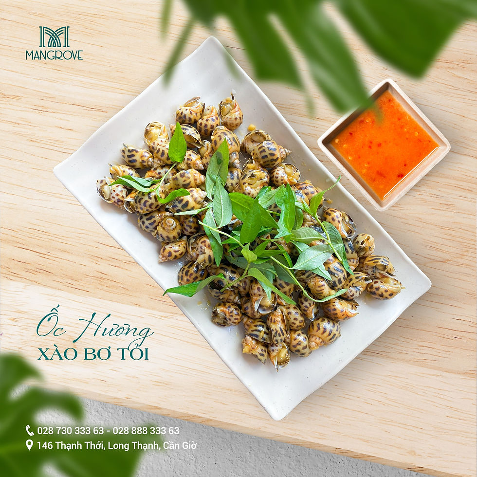 Ốc hương xào bơ tỏi vàng óng, béo thơm – món ngon khó quên tại Mangrove Hotel