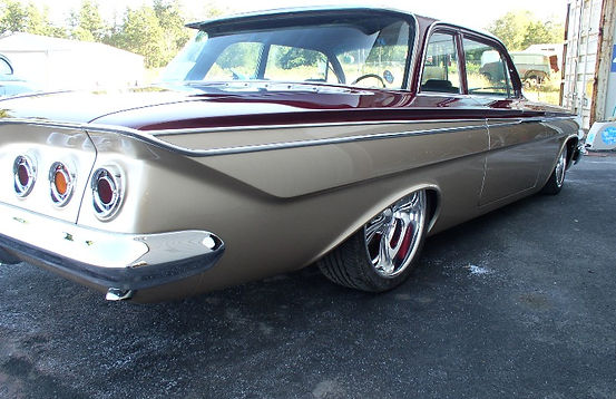 1961 Chevy Impala painted red and gold