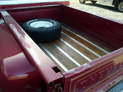 Pre-project 1977 Chevy Truck bed, wood grain panels.