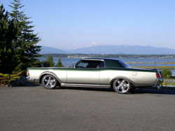 1972 Lincoln Continental side view in front of Anacortes' Fidalgo Bay.