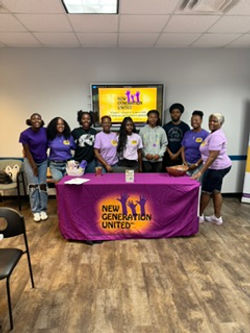 NGU students and team behind the New Generation United event table