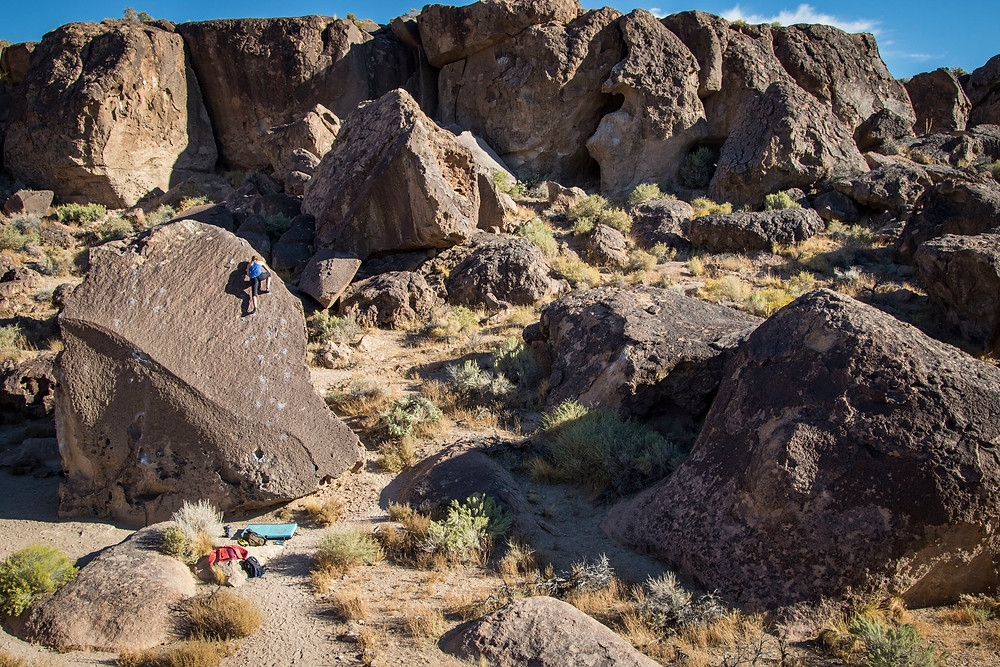 climbing the buttermilks boulders in bishop california