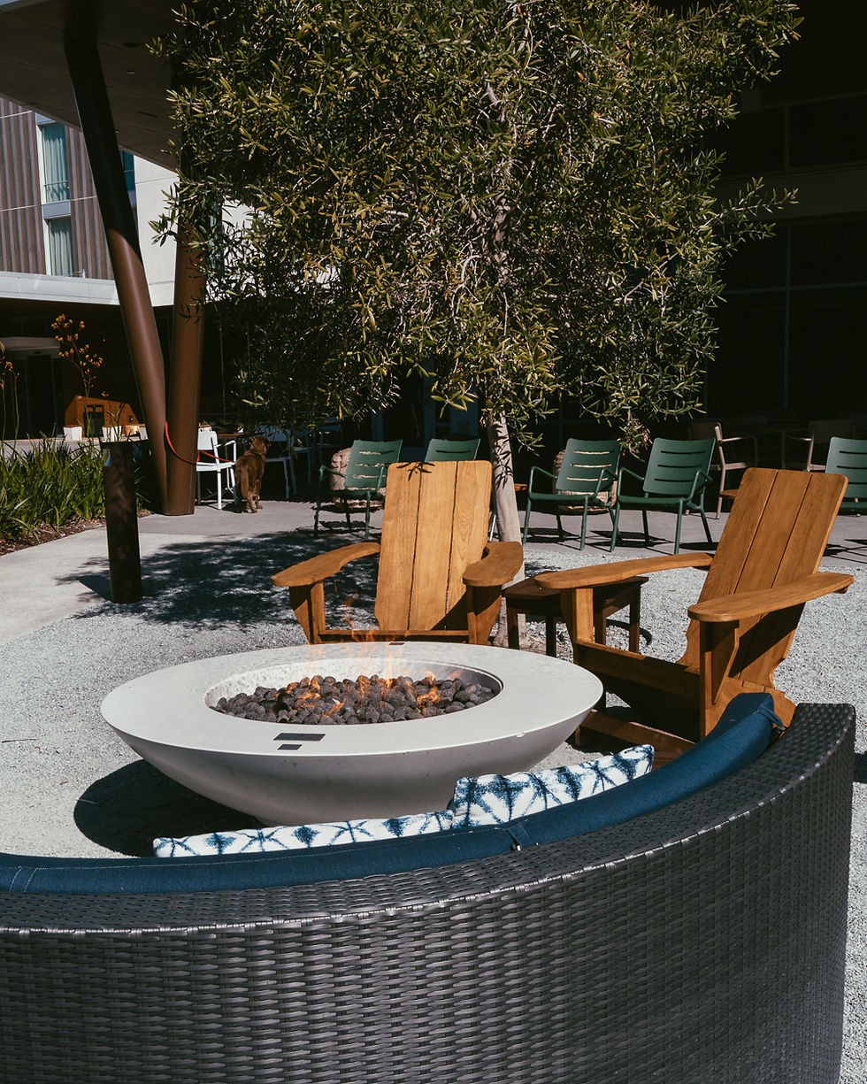 Fireplace seating and fire pit at the Roger bar and restaurant