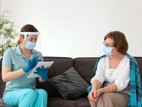 Medical Staff Maintain Safety During Home Visit