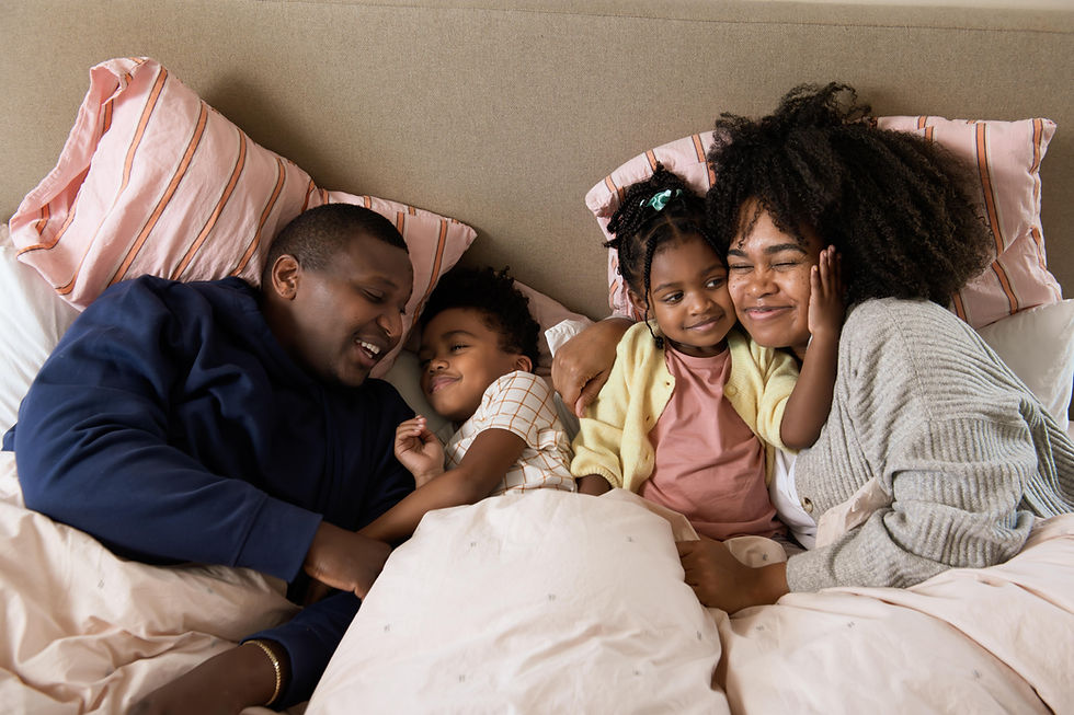 Happy family enjoy bedtime together.