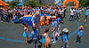 Blippi interacting with children wearing matching Blippi clothes, exchanging cheerful high-fives