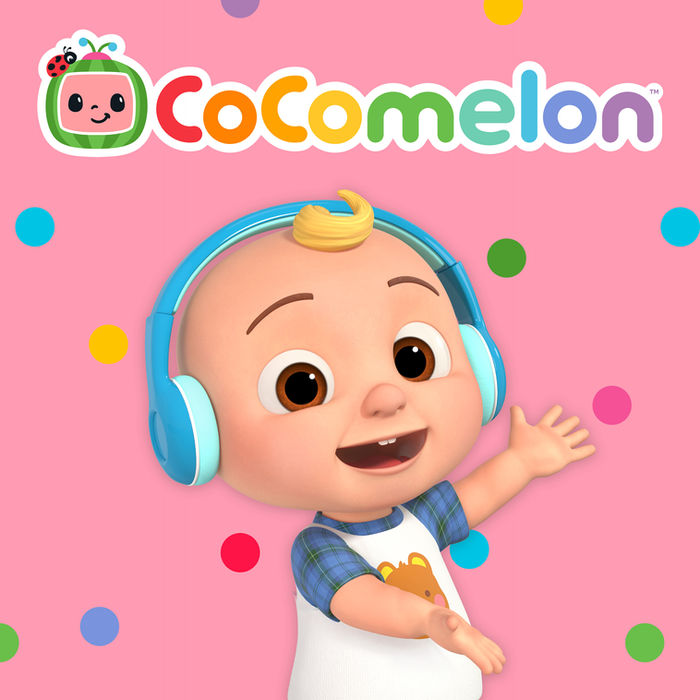 JJ from CoComelon in headphones smiles with the CoComelon logo on a pink background with colorful dots