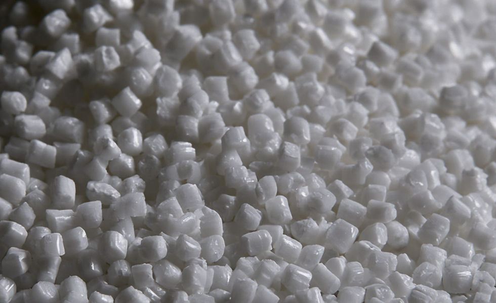 White industrial pellets used in material manufacturing