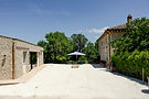 The courtyard betThe Piazzetta courtyard between the Main Villa and Guest Pavilion at Poggio Posillipoween the two buildings at Poggio Posillipo