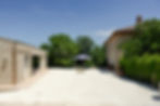 The Piazzetta courtyard between the Main Villa and Guest Pavilion at Poggio Posillipo