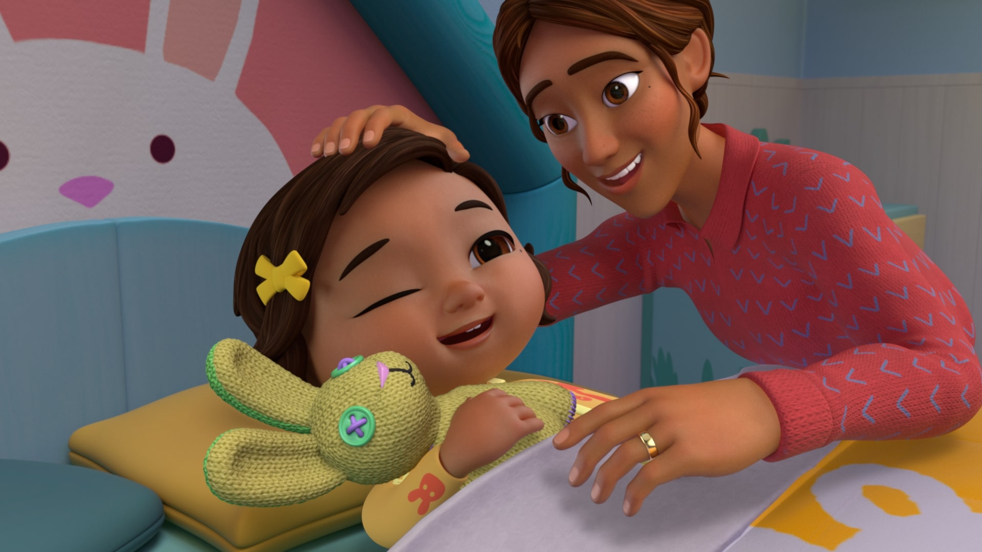 Nina’s mom tucks her daughter into bed with a plush bunny, saying "Goodnight, sweet dreams," as featured in CoComelon’s "Good Night World" episode.