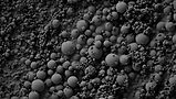 Microscopic view of spherical technology particles.