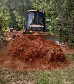 Bulldozer moving dirt for a construction site 