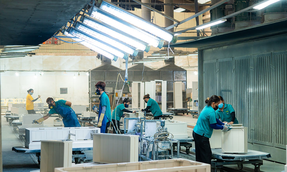 people working in a wood factory