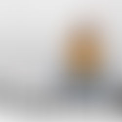 Woman on top of a podcast poster listening contentedly with headphones