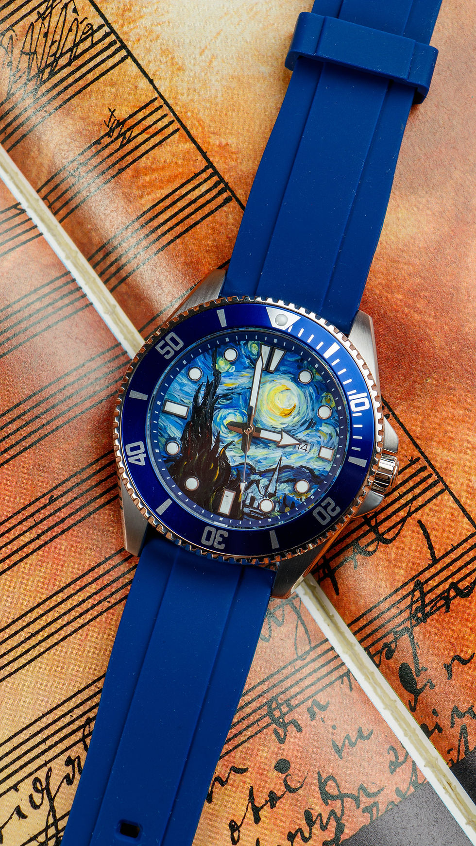 Hand-painted watch dial with a blue strap