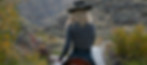 Cowgirl riding out on the first horse drive of the season at Silver Spur Ranch in the Idaho Rocky Mountains.