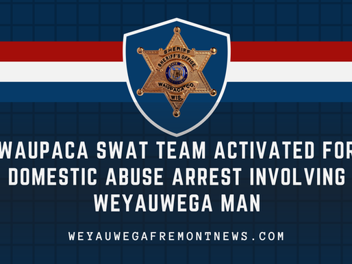 Sheriff's badge on blue grid, text: Waupaca SWAT team activated for domestic abuse arrest involving Weyauwega man. Website at bottom.