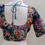 Thumbnail: Back of digital print teal blouse with sequin