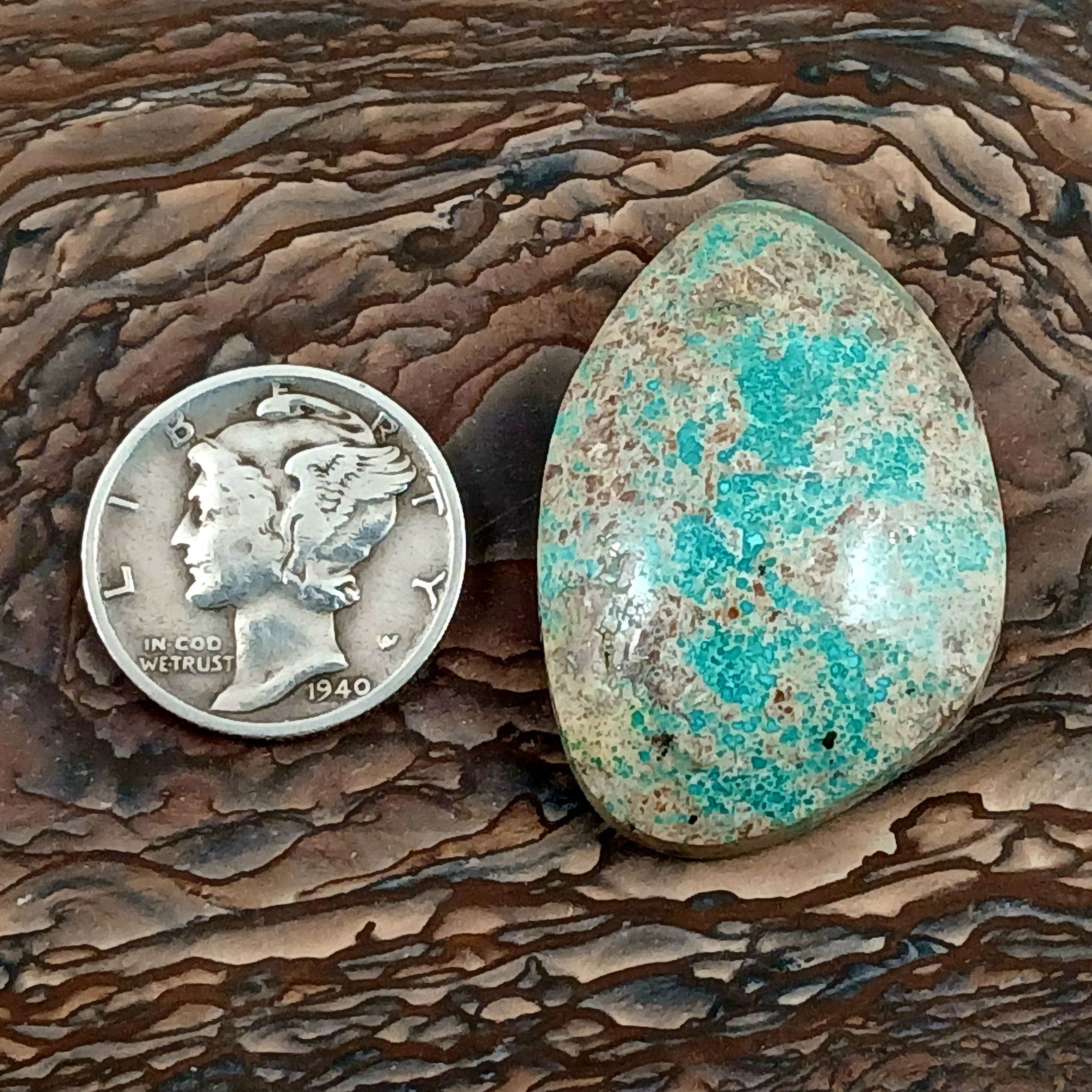A natural, mix of U.S. mines turquoise cabochon