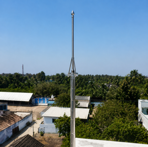 Lightning rod installed on a white rooftop