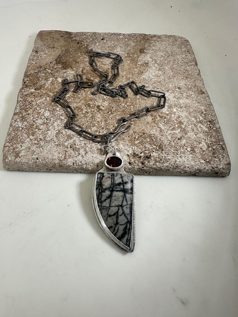 Thumbnail: Picasso Stone and Garnet pendant with 18 inch sterling  elongated loop chain   