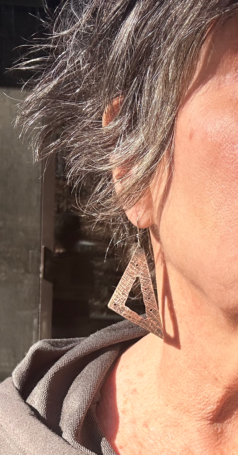 Thumbnail: Textured Copper and Sterling Triangle cut out Earrings