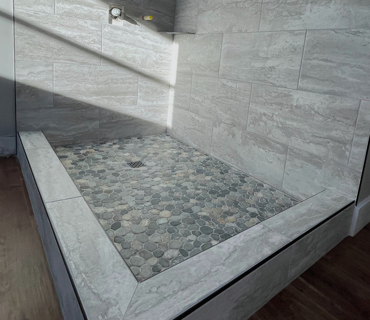 Custom tile shower upgrade with mosaic floor and bench (Chattanooga, TN)