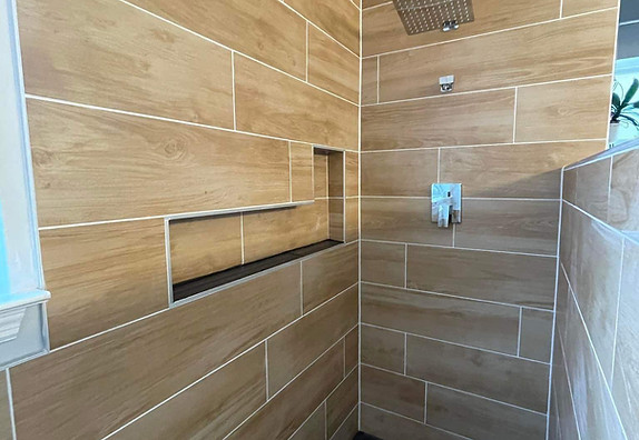 Chattanooga Tile Company Showcasing wood like tile shower in chattanooga and surrounding areas