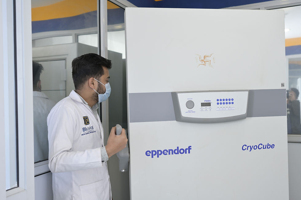 Technician accessing Eppendorf CryoCube deep freezer at Bluvial Labs