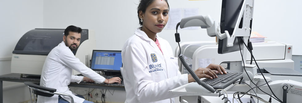 Expert technicians at bluvial labs running immunoassay and biochemistry tests.