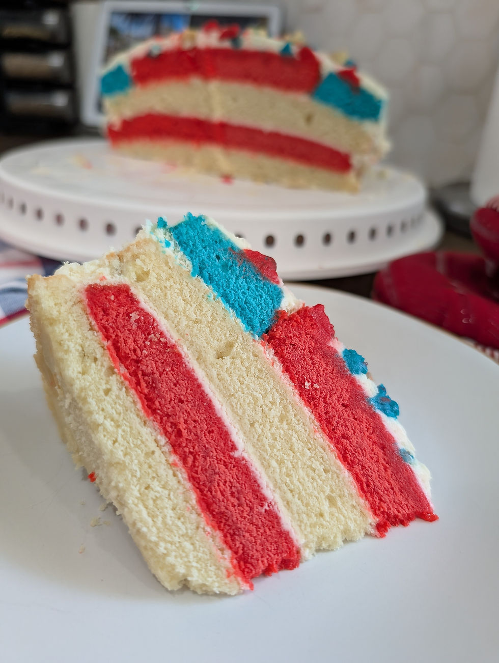 Red, White, and Blue Layered Cake with an American Flag Surprise