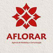 Logótipo completo da Aflorar com a assinatura Agência de Marketing e Comunicação, sobre uma textura de linho claro.
