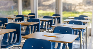 Empty School Desks.png