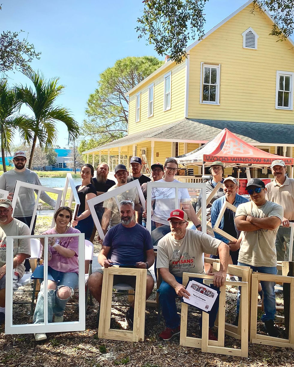 Total Window Makeover and Intro to Sash Making pose with their completed window restoration and joinery projects