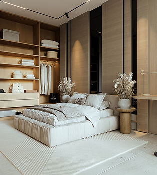 Chambre moderne avec lit, armoire et décoration minimaliste. RÉSIDENCE AFIYA.