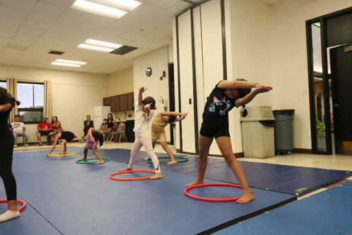 Gymnastics class stretching