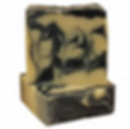 Two bars of yellow and black vegan, all-natural soap, with one sitting on t op of the other