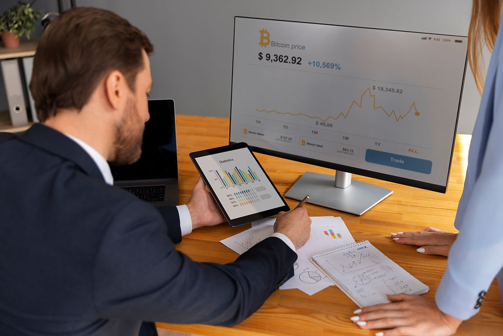 business-person-looking-finance-graphs.jpg