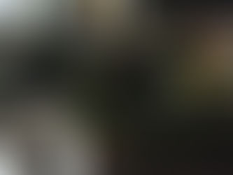 Image by Cottonbro Studio on Pexels of a woman lying on a couch reading.