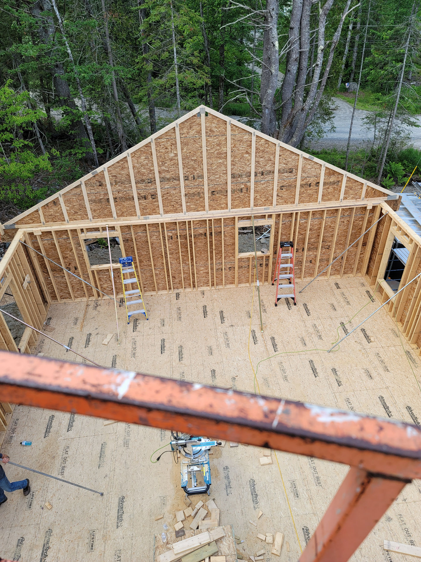 Wooden structure under construction, view from above.