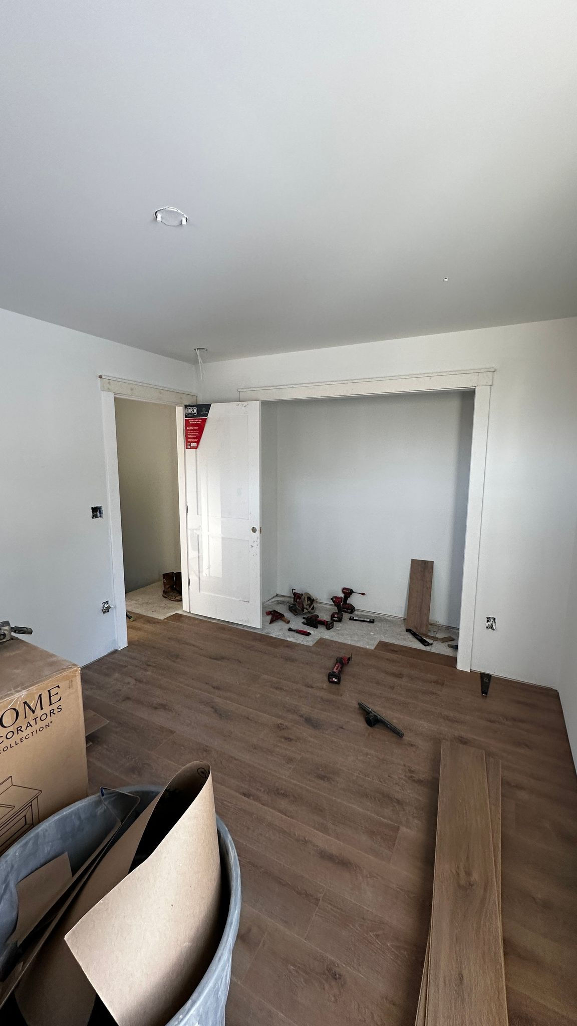 Room under renovation with open closet space.