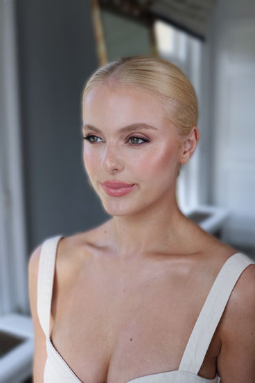 Bridal Low Sleek Bun Updo on Blonde Hair 