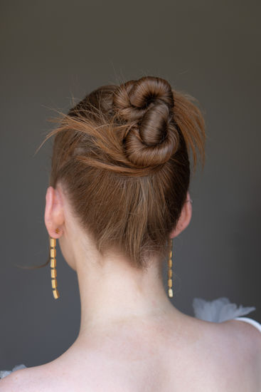 Bridal Twisted high bun on a redhead bride London