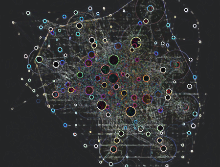 Knowledge graph/abstract network visualisation on a dark background, showing a dense web of fine, map-like lines and multicoloured circular nodes.