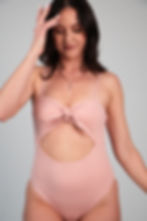 Close-up of Maeli Rosé One-Piece Swimsuit front knot detail